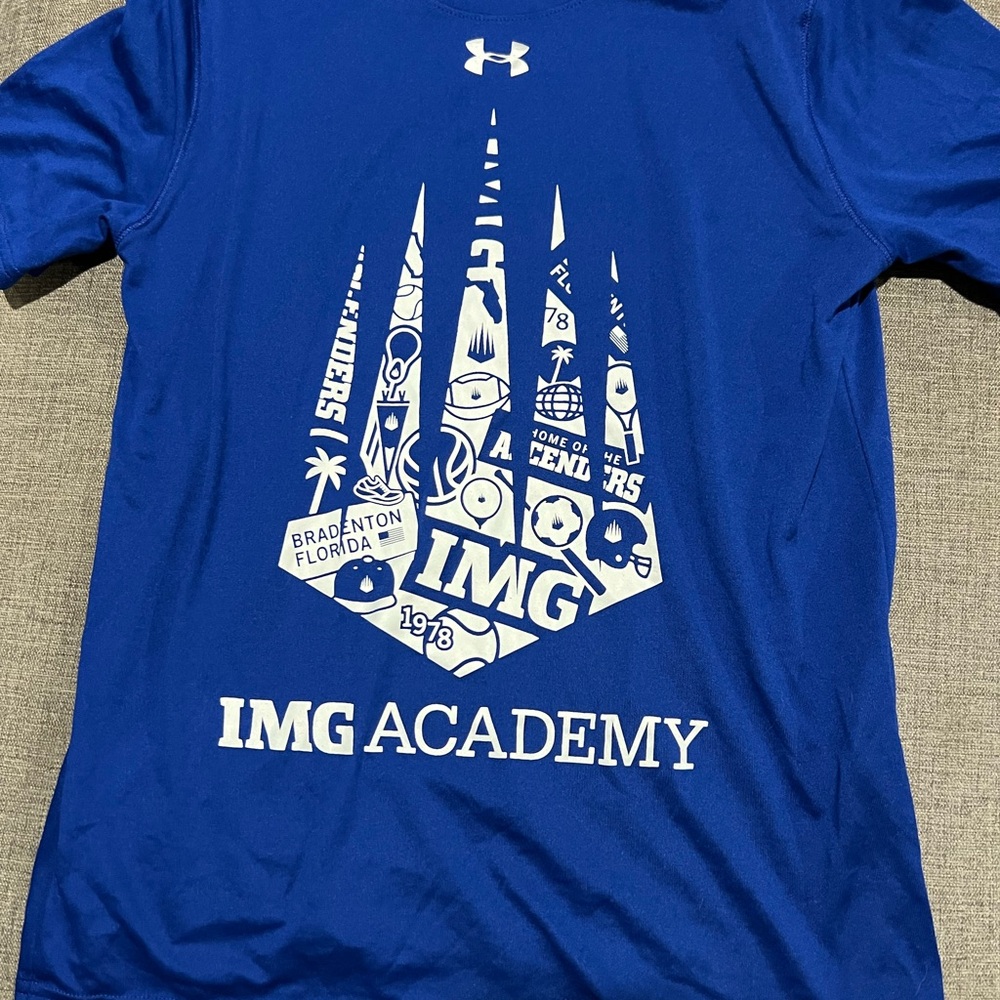 Under Armour Blue Kids Shirt with White IMG Academy Graphic